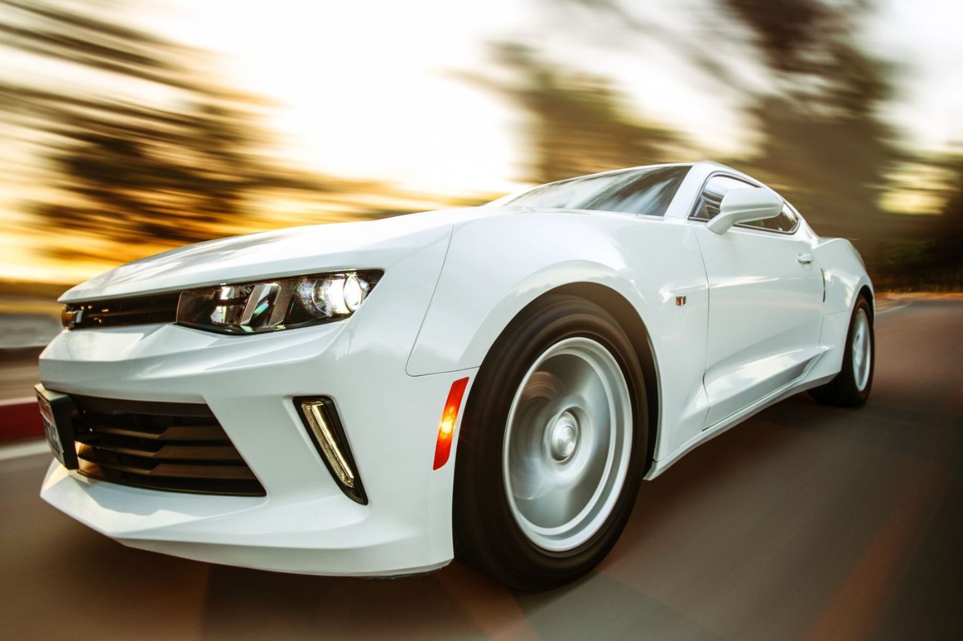 A White Sportscar in Motion Showcasing Speed jigsaw puzzle