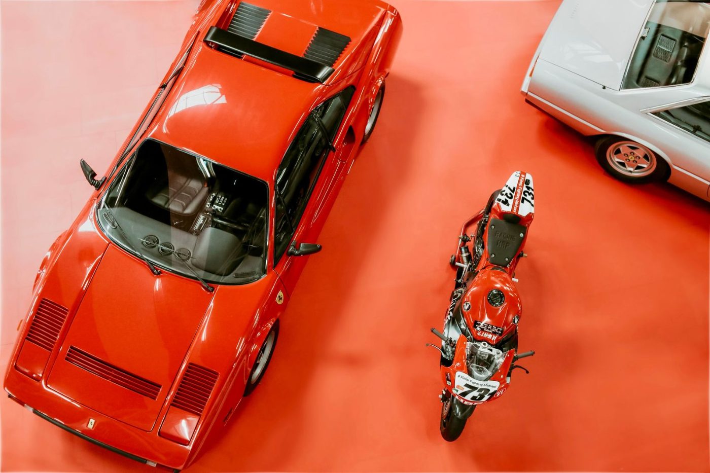 High Angle Shot of Classic Ferrari and jigsaw puzzle