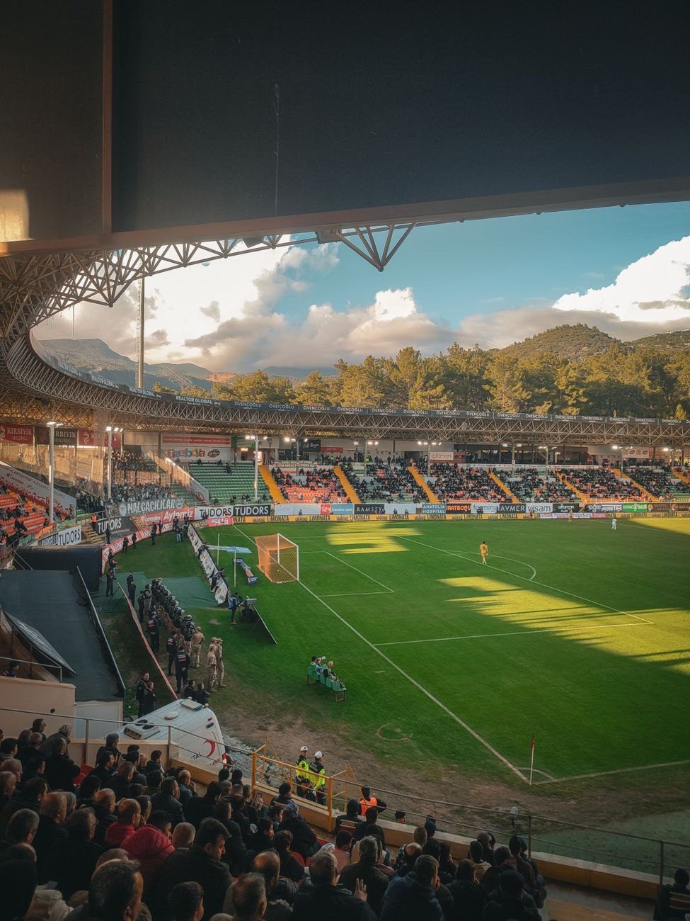 A Bustling Soccer Stadium at Sunset with jigsaw puzzle