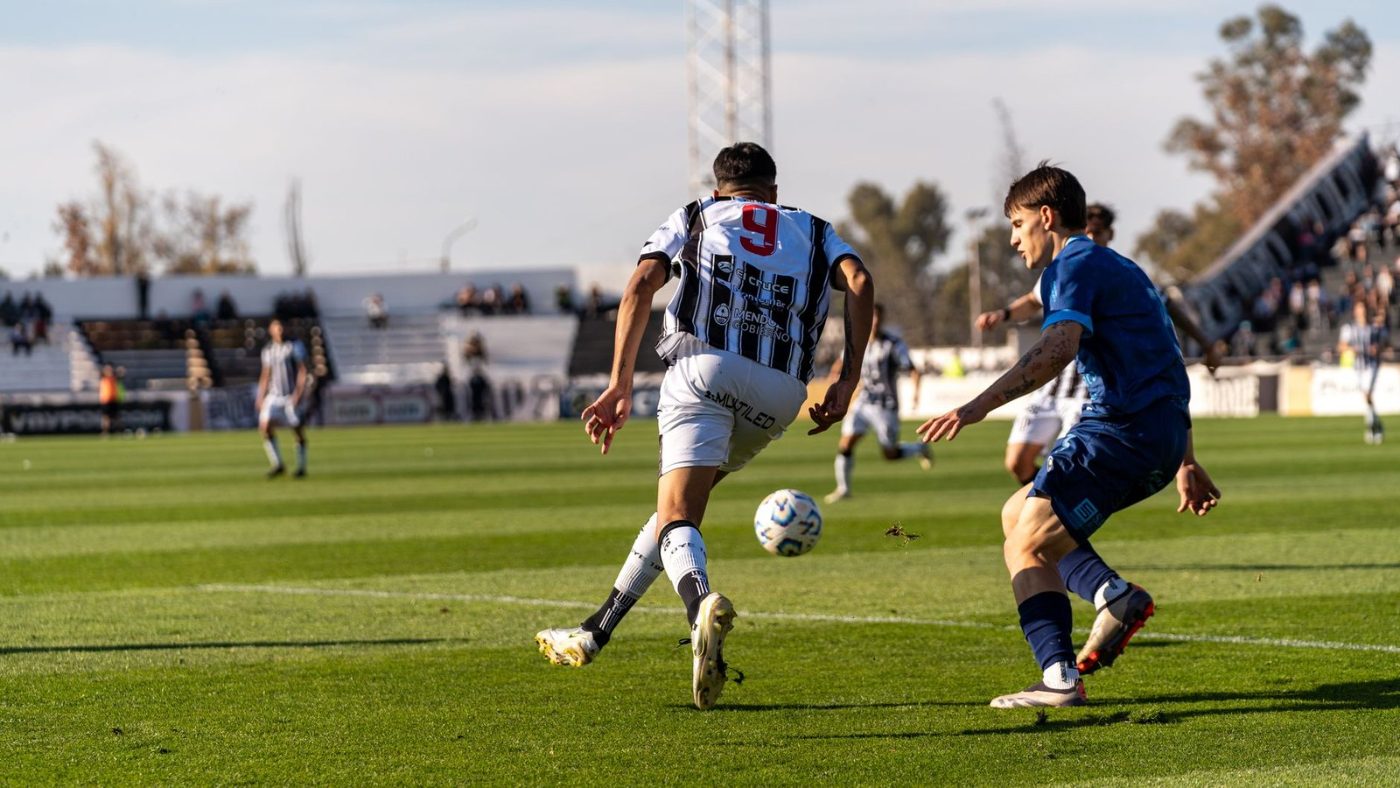 Players in Action on the Soccer Field jigsaw puzzle