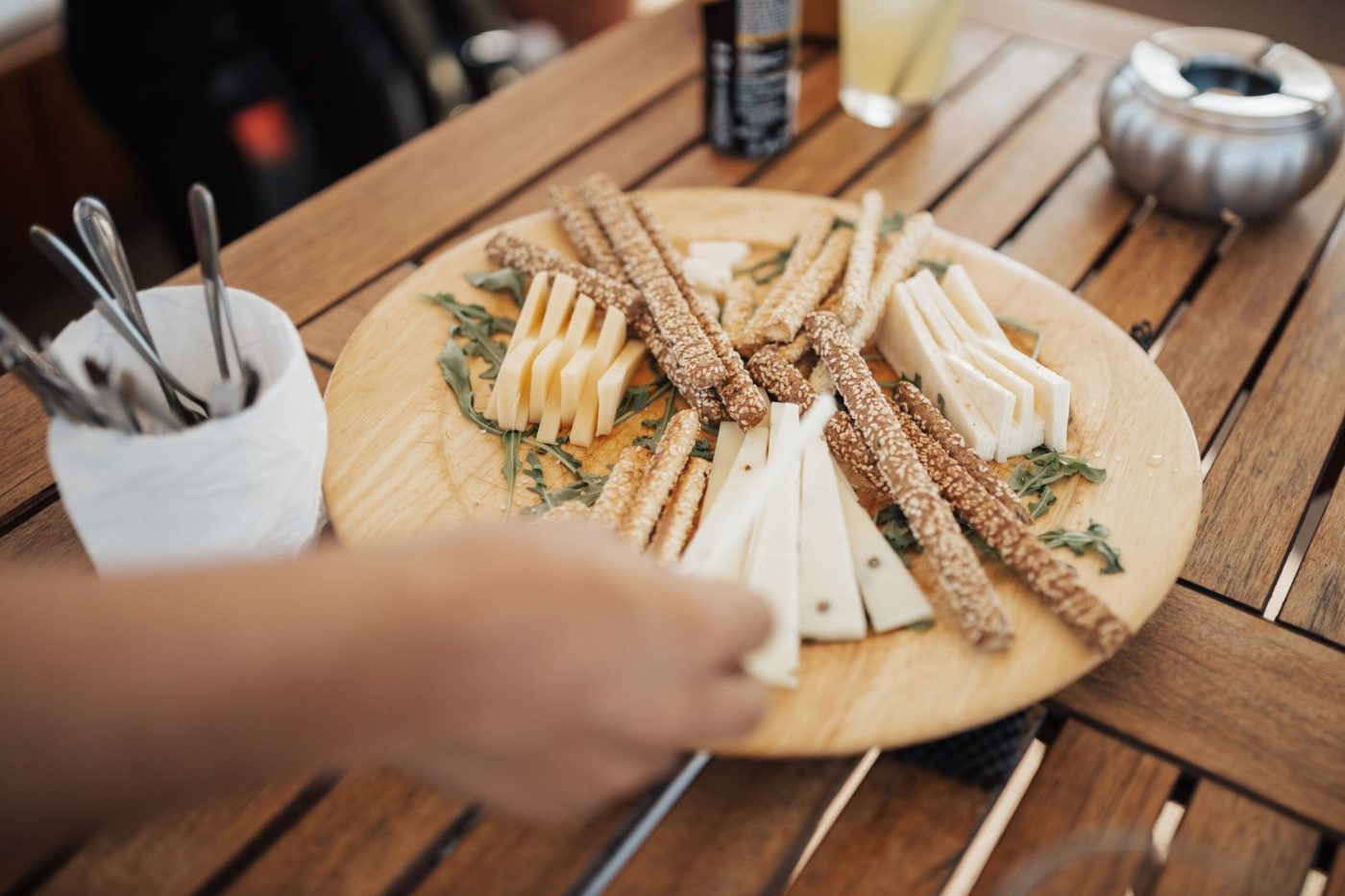 A Wooden Platter with Assorted Cheeses and jigsaw puzzle