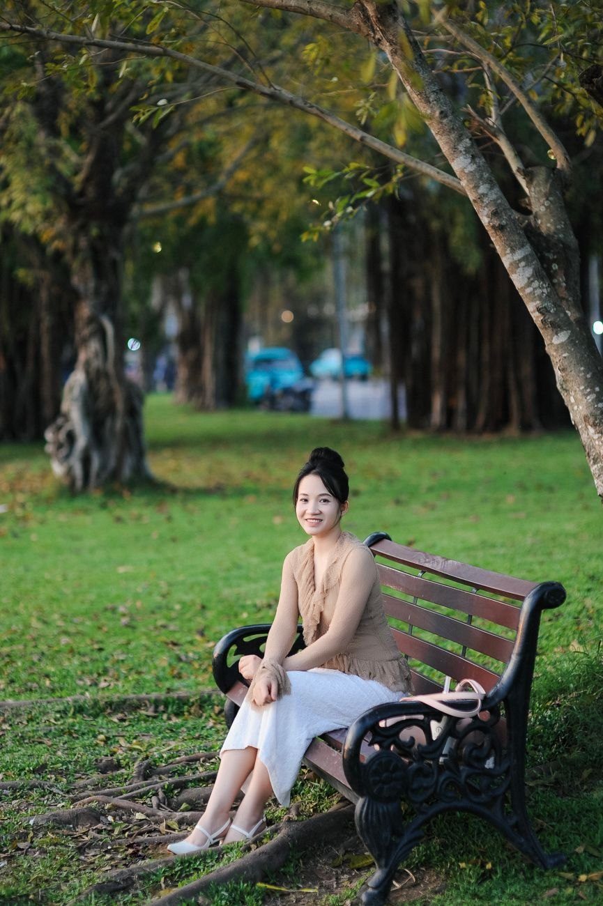 A Woman Sits on a Park Bench jigsaw puzzle