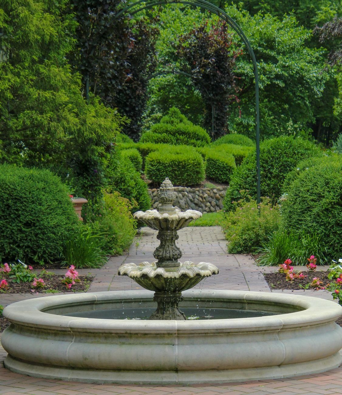 Beautiful Stone Fountain in a Tranquil Garden jigsaw puzzle