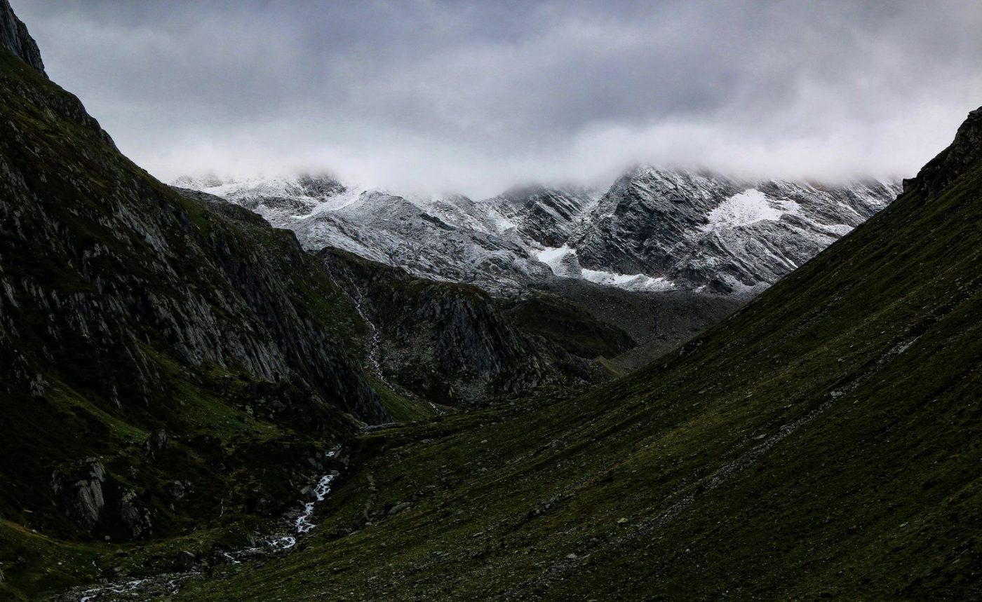 Explore Stunning Snow Capped Mountains Cloaked in jigsaw puzzle