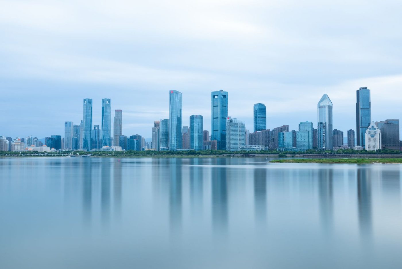A Serene View of Modern Skyscrapers Reflecting jigsaw puzzle